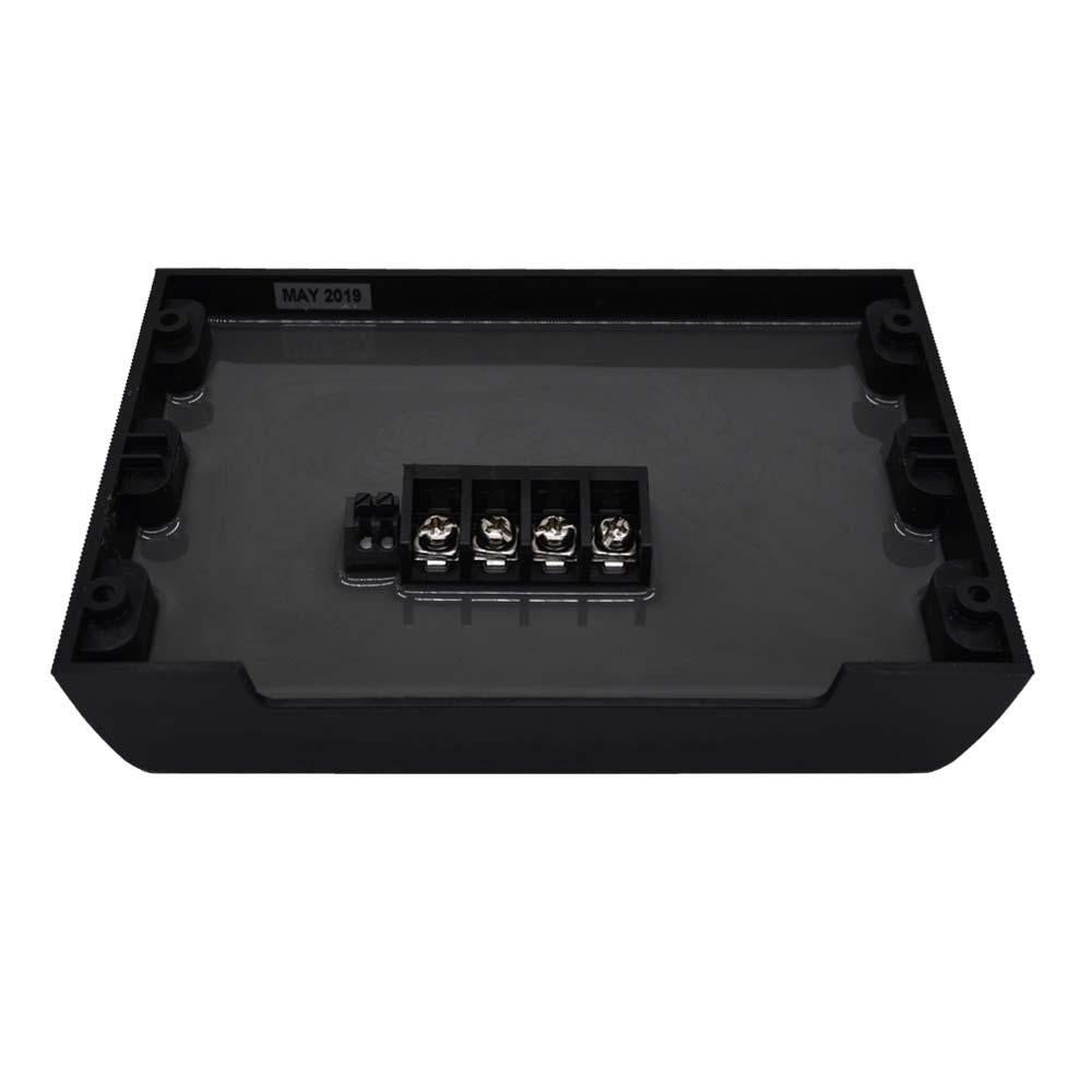 Black electronic module with connectors on a white background