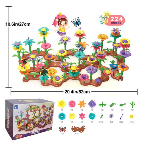 Toy garden set with flowers, butterflies, and a box labeled 'Garden Garden' on a white background.