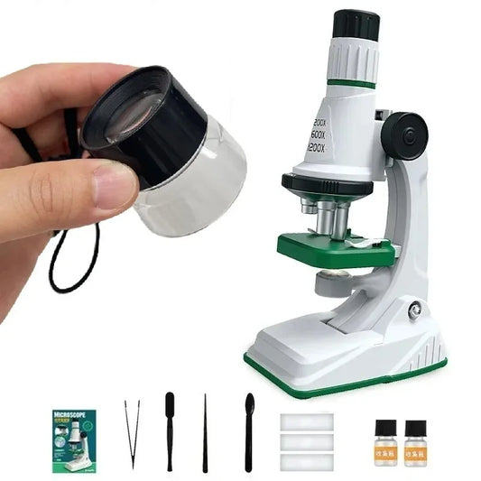 Microscope with accessories on a white background