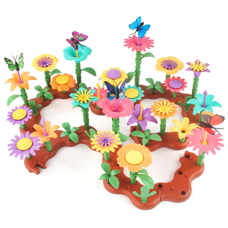 Colorful toy garden with flowers and butterflies on a white background