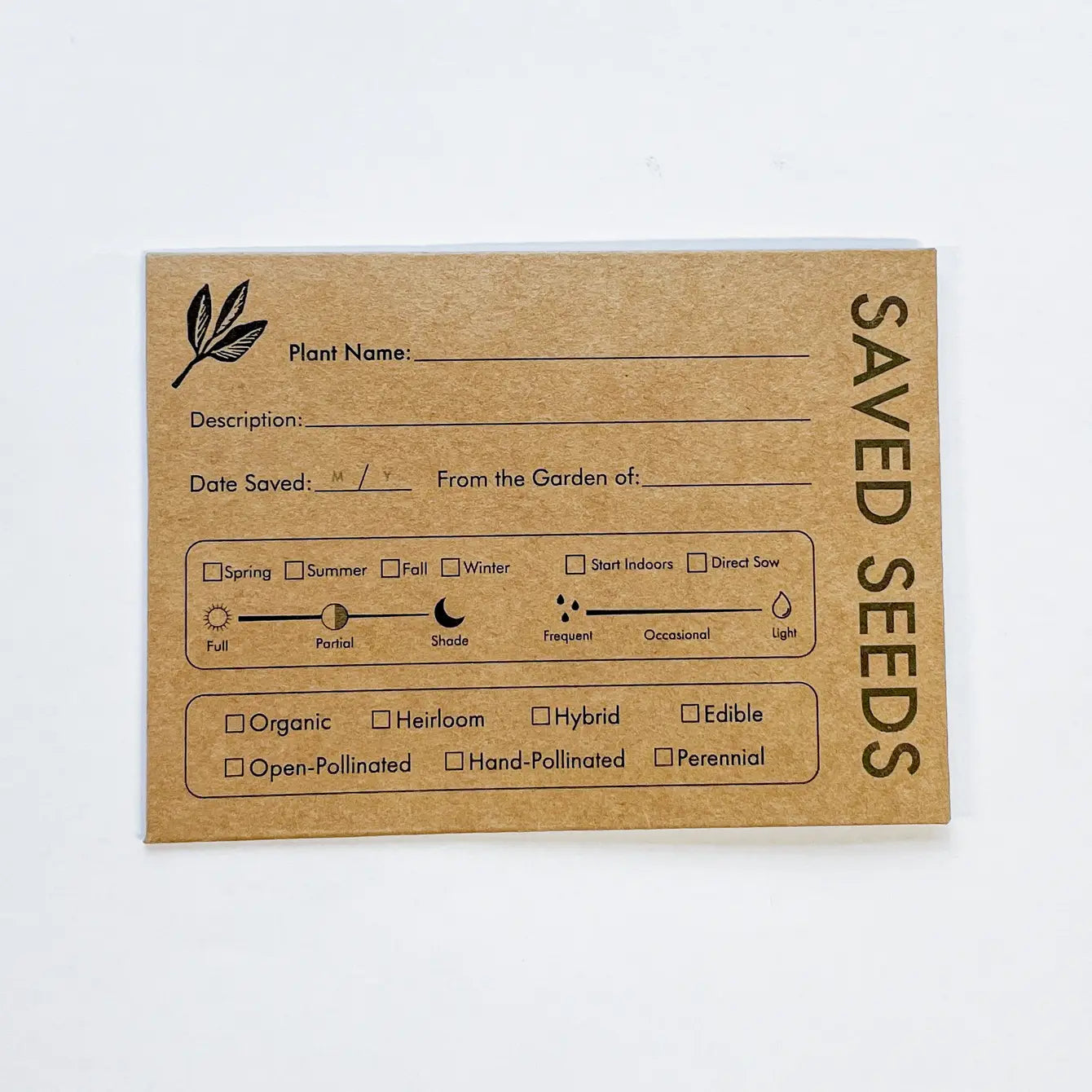 Kraft paper seed saving envelope with printed labels on a white background