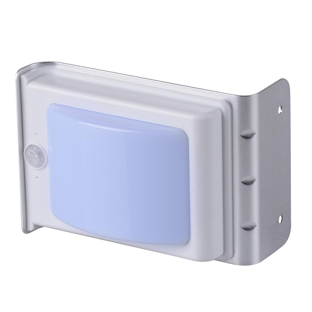 White electronic device with a blue light on a white background