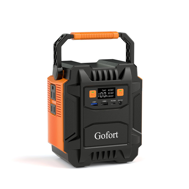 Black and orange portable power station with digital display on a white background