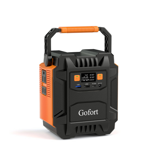 Black and orange portable power station with digital display on a white background