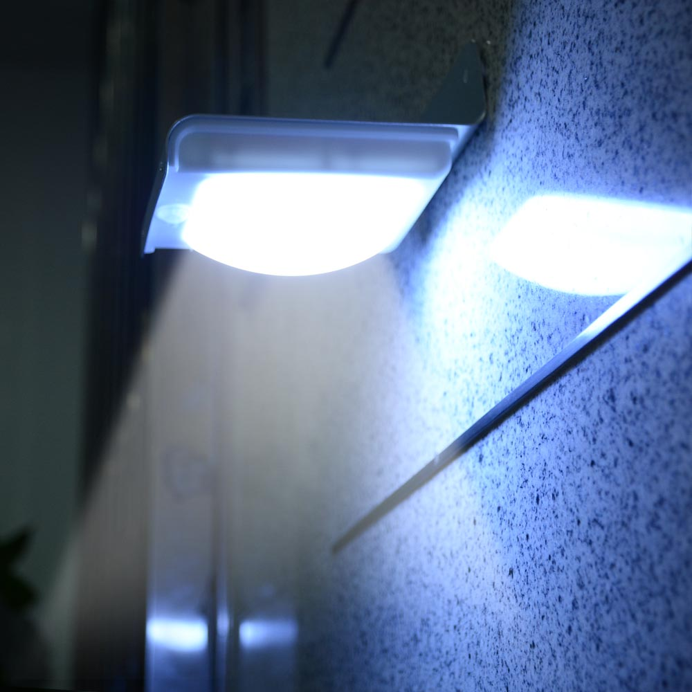 Small white light bulb attached to a textured surface