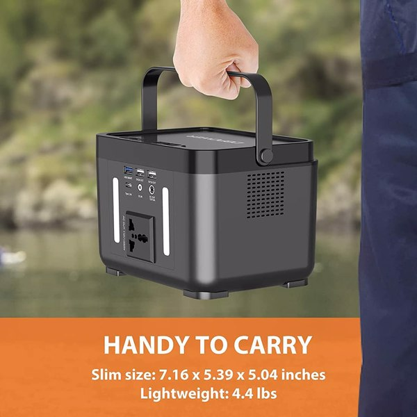 Portable power station being held with outdoor background