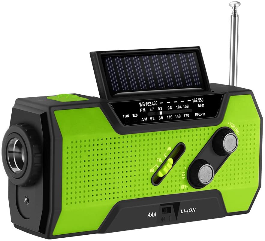 Green and black portable radio with solar panel on a white background