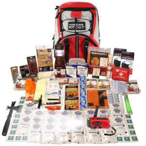 Comprehensive hurricane kit with various supplies including a red backpack, tools, and emergency items on a white background.